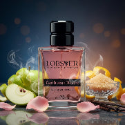Perfume bottle labeled 'LOBSTER Caribbean Desire' with fruits and flowers on a reflective surface.