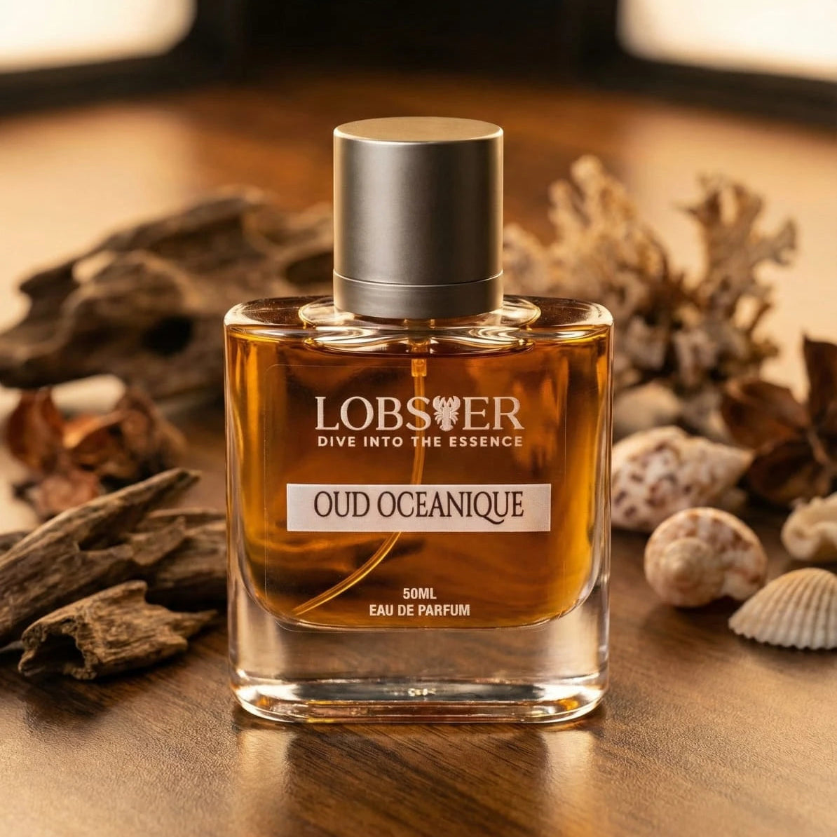 Lobisser Oud Oceanique perfume bottle on a wooden surface with natural elements.