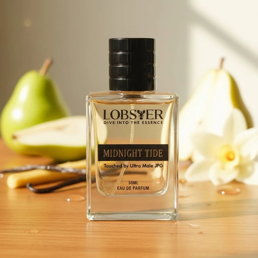 Lobster Midnight Tide perfume bottle on a wooden surface with pears and flowers in the background
