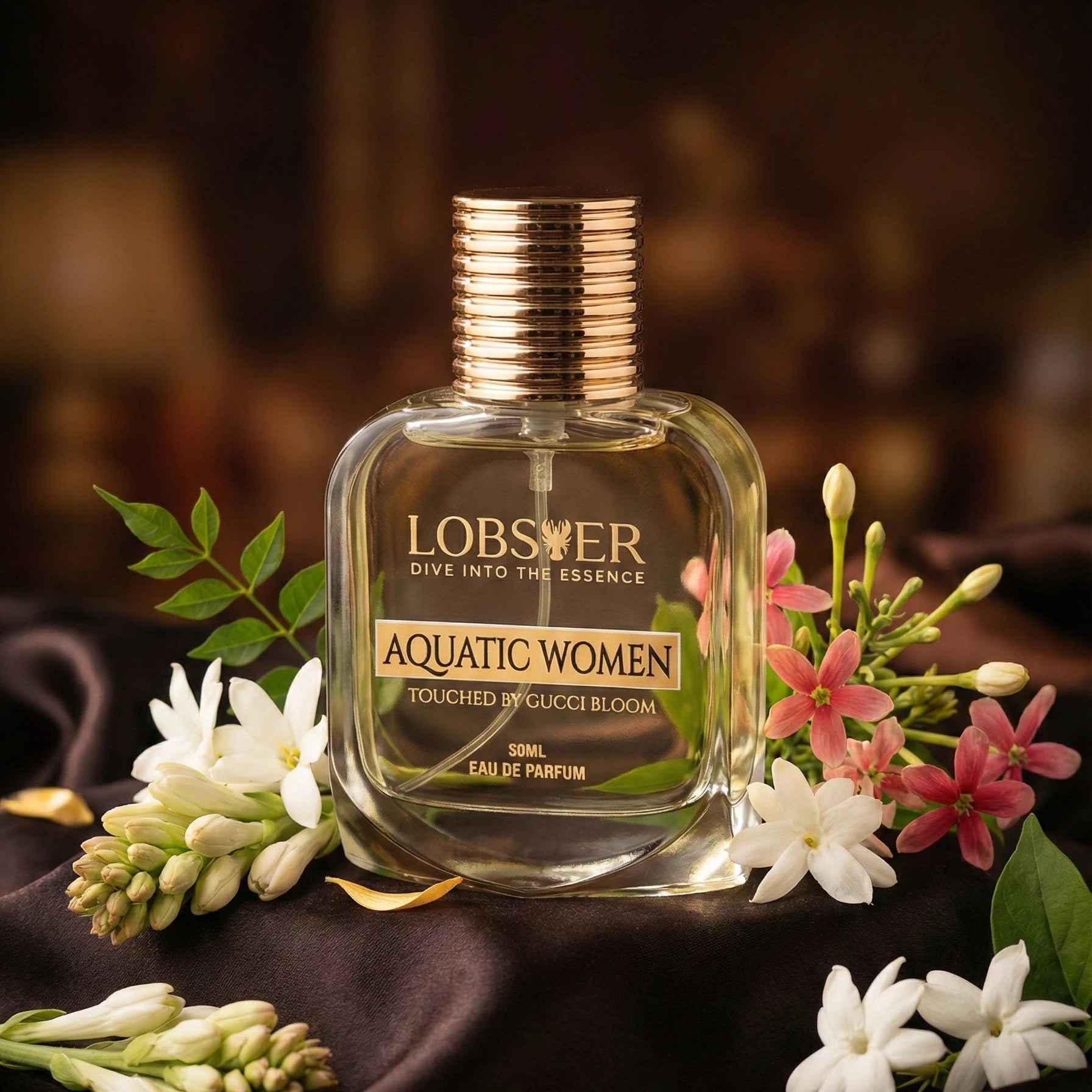 Lobser Aquatic Women perfume bottle with flowers on a dark fabric background