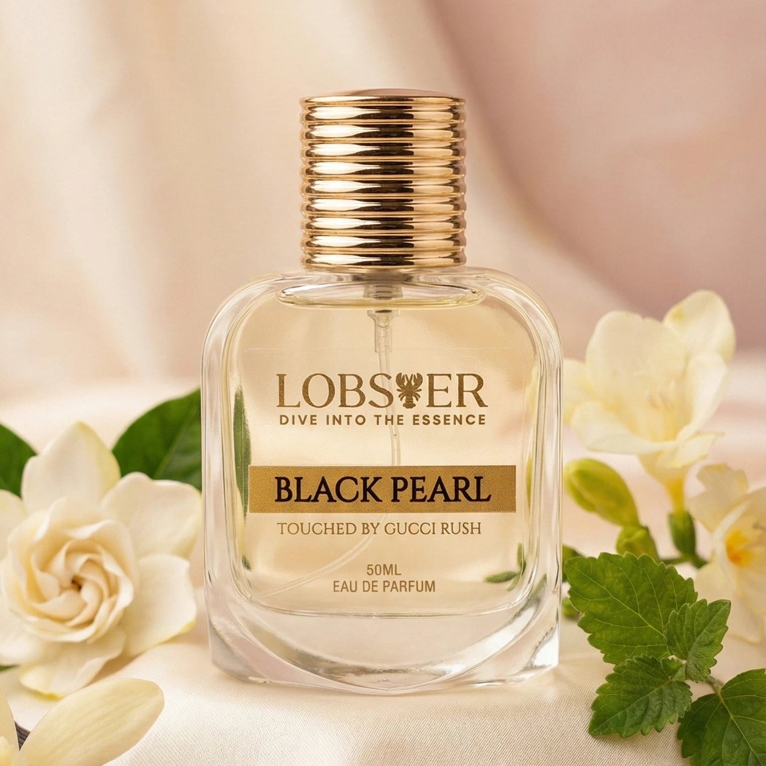 Lobisser Black Pearl perfume bottle with vanilla beans and flowers on a soft background